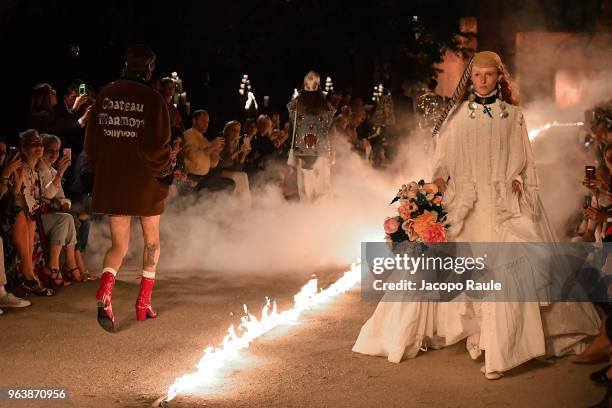 Model walks the runway at the Gucci Cruise 2019 show at Alyscamps on May 30, 2018 in Arles, France.