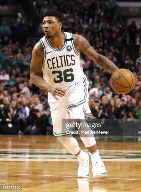 Marcus Smart of the Boston Celtics dribbles against the Cleveland Cavaliers during Game Seven of the 2018 NBA Eastern Conference Finals at TD Garden...