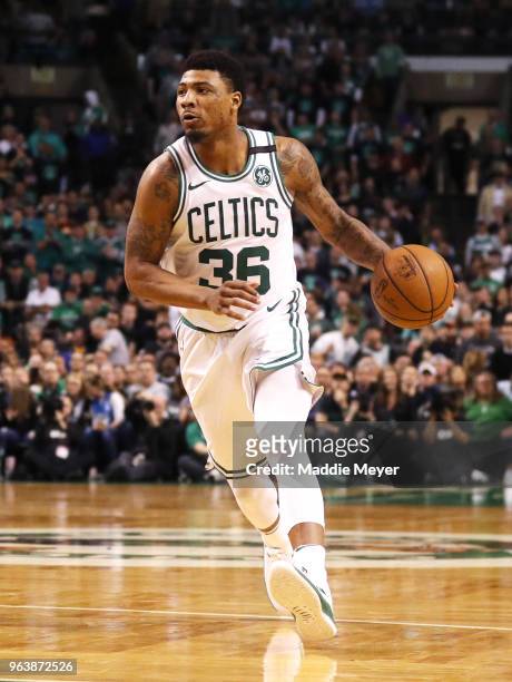 Marcus Smart of the Boston Celtics dribbles against the Cleveland Cavaliers during Game Seven of the 2018 NBA Eastern Conference Finals at TD Garden...