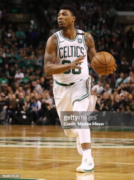 Marcus Smart of the Boston Celtics dribbles against the Cleveland Cavaliers during Game Seven of the 2018 NBA Eastern Conference Finals at TD Garden...