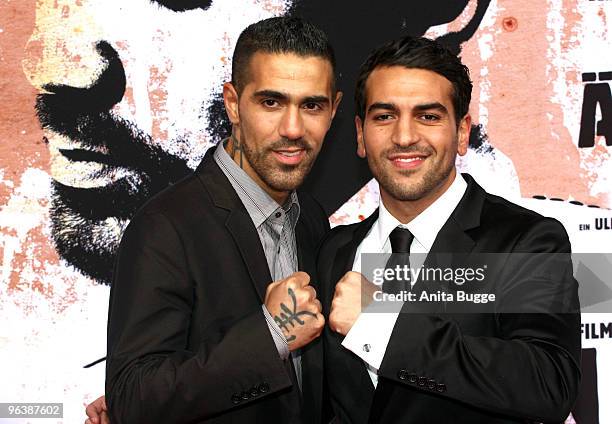 Singer and actor Bushido and actor Elyas M'Barek attend the 'Zeiten Aendern Dich' German Premiere on February 3, 2010 in Berlin, Germany.
