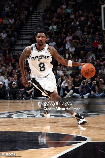 Roger Mason Jr. #8 of the San Antonio Spurs drives the ball up court during the game against the Utah Jazz at AT&T Center on January 20, 2010 in San...