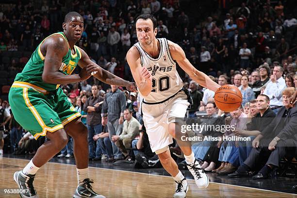 Manu Ginobili of the San Antonio Spurs drives to the basket against Ronnie Brewer of the Utah Jazz during the game at AT&T Center on January 20, 2010...