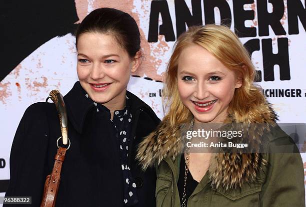 Actress Hannah Herzsprung and Anne-Sophie Briest attend the 'Zeiten Aendern Dich' German Premiere on February 3, 2010 in Berlin, Germany.