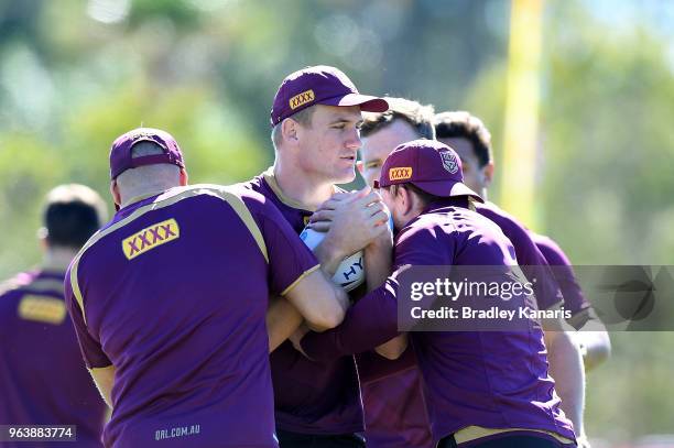 Coen Hess takes on the defence during a Queensland Maroons training session at Sanctuary Cove on May 31, 2018 at the Gold Coast, Australia.