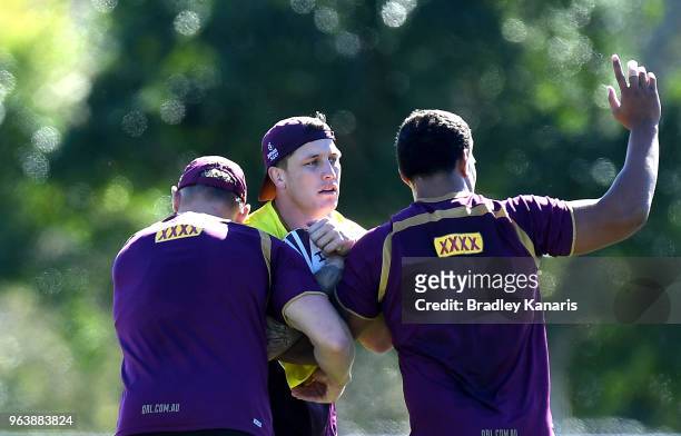 Jarrod Wallace takes on the defence during a Queensland Maroons training session at Sanctuary Cove on May 31, 2018 at the Gold Coast, Australia.