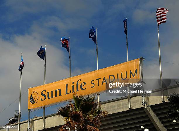 Flags fly above Sun Life Stadium on February 3, 2010 in Miami Gardens, Florida. Sun Life Stadium, which recently had its named changed from Land...