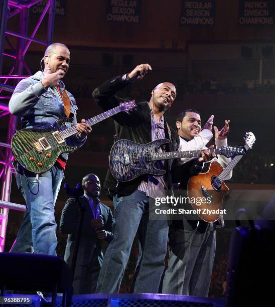 Anthony "Romeo" Santos, Bernie Williams and Max Santos perform at Madison Square Garden on February 2, 2010 in New York City.