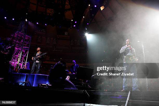 Bernie Williams and Anthony "Romeo" Santos perform at Madison Square Garden on February 2, 2010 in New York City.