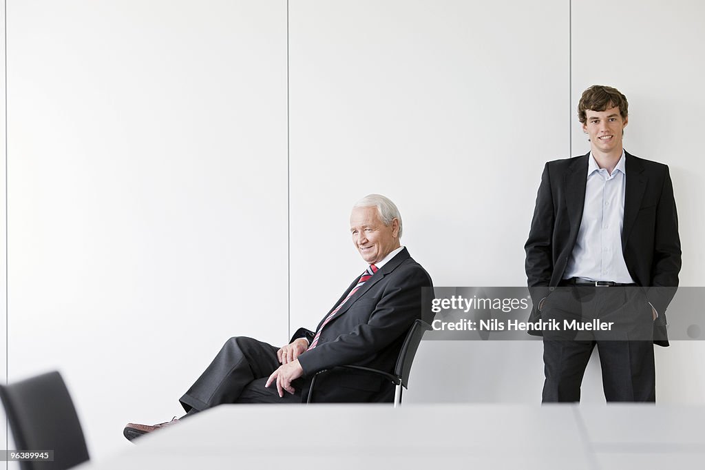 Two businessmen in meeting room