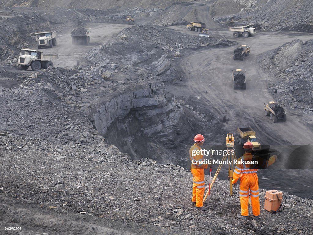 Coal Miners Surveying Mine From Above