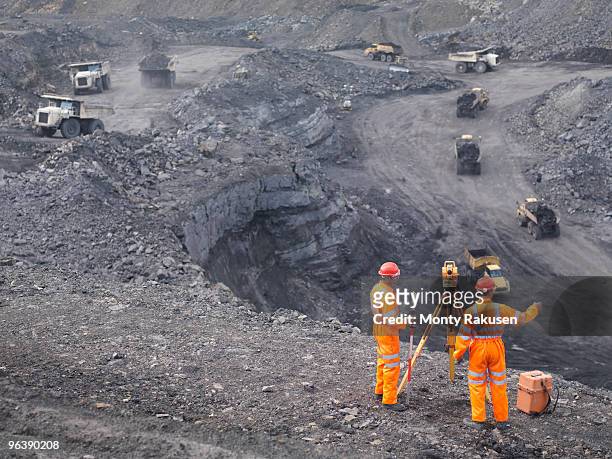 coal miners surveying mine from above - archaeology dig stock pictures, royalty-free photos & images
