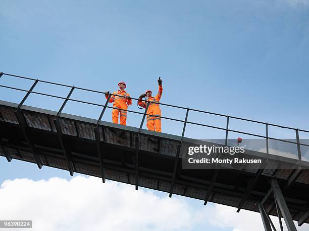 coal workers on viewing platform - mining low angle foto e immagini stock