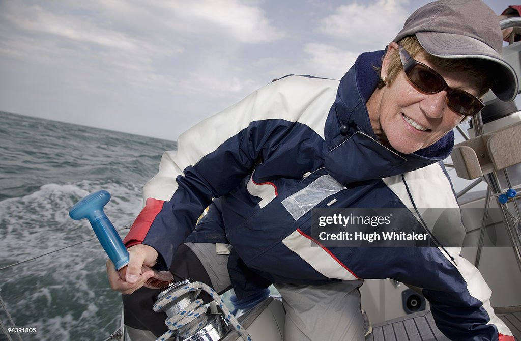 Mature woman sailing