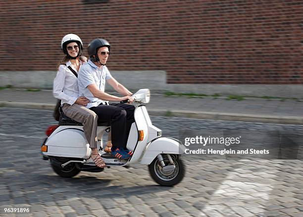 couple on scooter - man with scooter bildbanksfoton och bilder