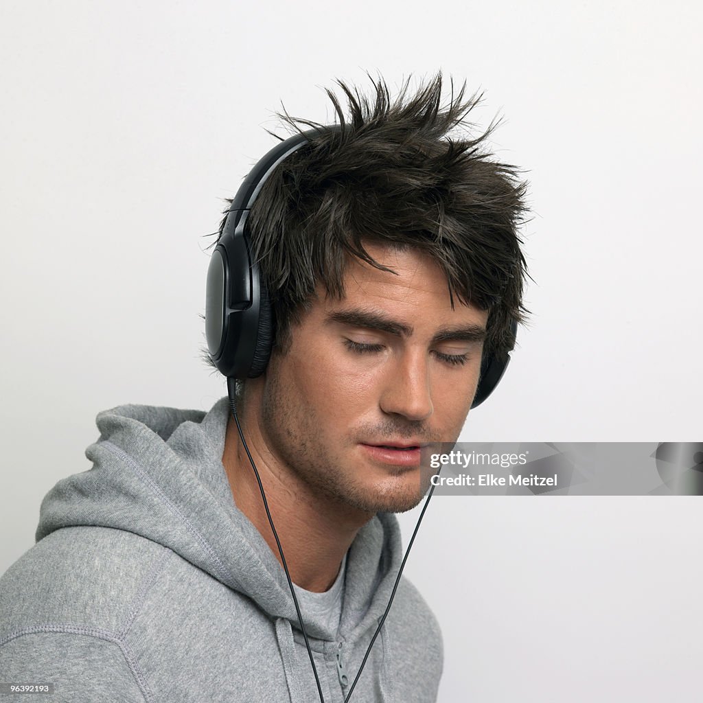 Young man listening to music