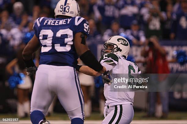 Quarterback Mark Sanchez of the New York Jets throws a Touchdown when the Indianapolis Colts host the New York Jets in the AFC Championship Game at...