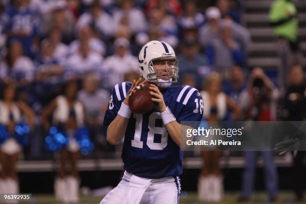 Quarterback Peyton Manning of the Indianapolis Colts passes the ball when the Indianapolis Colts hots the New York Jets in the AFC Championship Game...