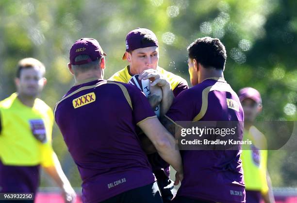 Jarrod Wallace takes on the defence during a Queensland Maroons training session at Sanctuary Cove on May 31, 2018 at the Gold Coast, Australia.