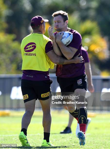 Gavin Cooper takes on the defence during a Queensland Maroons training session at Sanctuary Cove on May 31, 2018 at the Gold Coast, Australia.