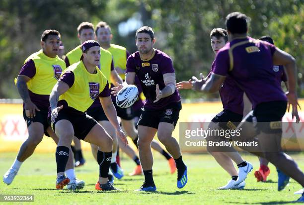 Andrew McCullough passes the ball during a Queensland Maroons training session at Sanctuary Cove on May 31, 2018 at the Gold Coast, Australia.