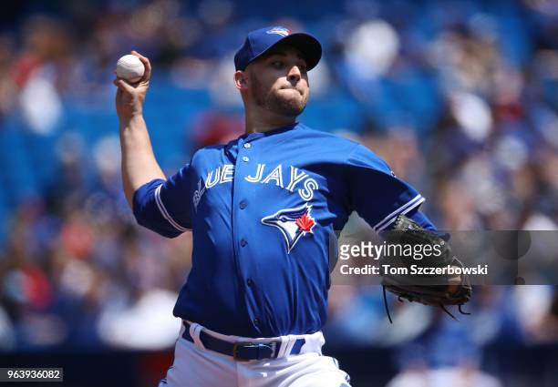 Marco Estrada of the Toronto Blue Jays delivers a pitch in the first inning during MLB game action against the Los Angeles Angels of Anaheim at...