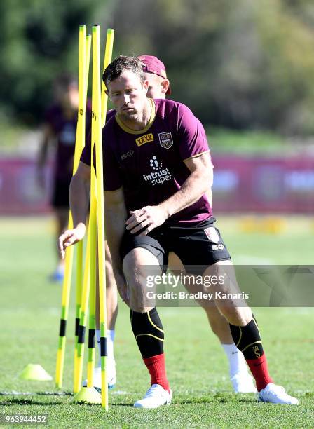 Gavin Cooper runs a training drill during a Queensland Maroons training session at Sanctuary Cove on May 31, 2018 at the Gold Coast, Australia.