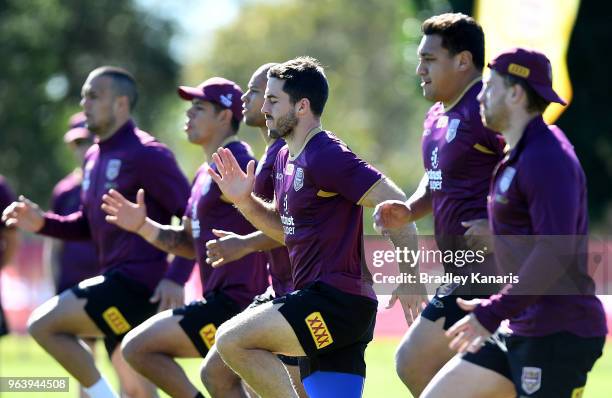 Ben Hunt and team mates warm-up during a Queensland Maroons training session at Sanctuary Cove on May 31, 2018 at the Gold Coast, Australia.