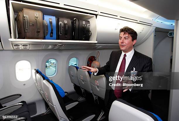 Kent Craver, Boeing Co.'s regional director of passenger satisfaction and revenue, talks about the overhead compartments and dimming windows featured...