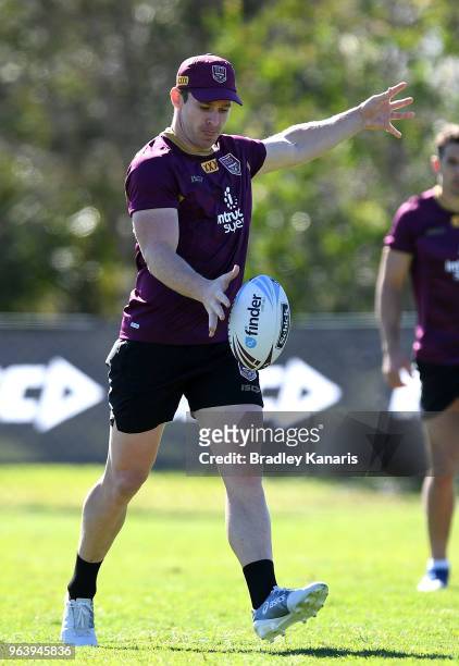 Michael Morgan kicks the ball during a Queensland Maroons training session at Sanctuary Cove on May 31, 2018 at the Gold Coast, Australia.