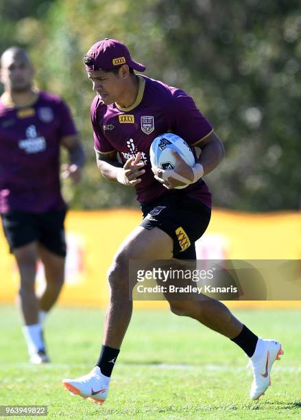 Dane Gagai runs with the ball during a Queensland Maroons training session at Sanctuary Cove on May 31, 2018 at the Gold Coast, Australia.