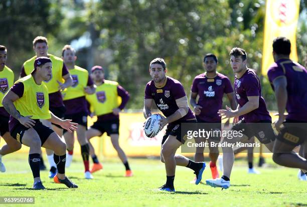 Andrew McCullough looks to pass during a Queensland Maroons training session at Sanctuary Cove on May 31, 2018 at the Gold Coast, Australia.