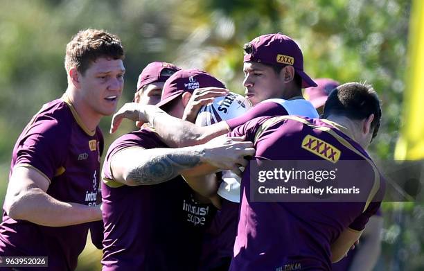 Dane Gagai takes on the defence during a Queensland Maroons training session at Sanctuary Cove on May 31, 2018 at the Gold Coast, Australia.