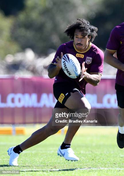 Felise Kaufusi runs with the ball during a Queensland Maroons training session at Sanctuary Cove on May 31, 2018 at the Gold Coast, Australia.