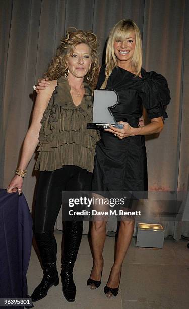 Kelly Hoppen presents Tess Daly with an award at the Rodial Beautiful Awards at the Sanderson Hotel on February 3, 2010 in London, England.