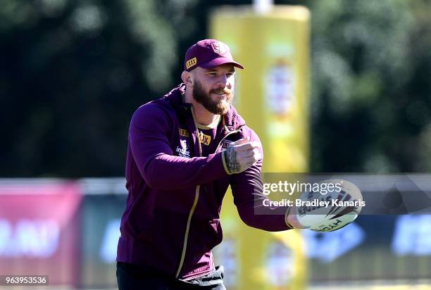 Josh McGuire passes the ball during a Queensland Maroons training session at Sanctuary Cove on May 31, 2018 at the Gold Coast, Australia.