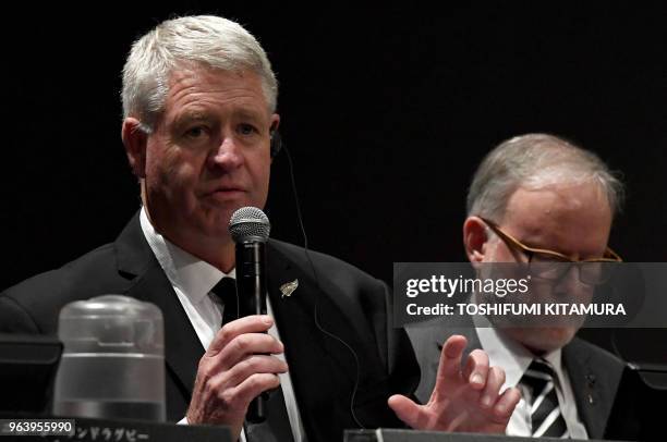 New Zealand Rugby Union CEO Steve Tew answers a question beside New Zealand's Ambassador to Japan Stephen Payton during the New Zealand national...