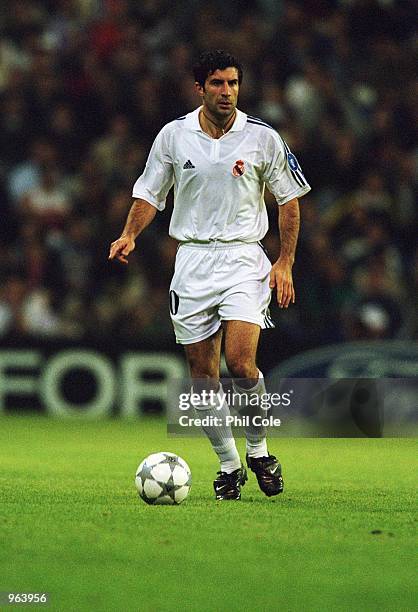 Luis Figo of Real Madrid on the ball during the UEFA Champions league match against AS Roma played at the Bernabeu Stadium in Madrid, Spain. \...