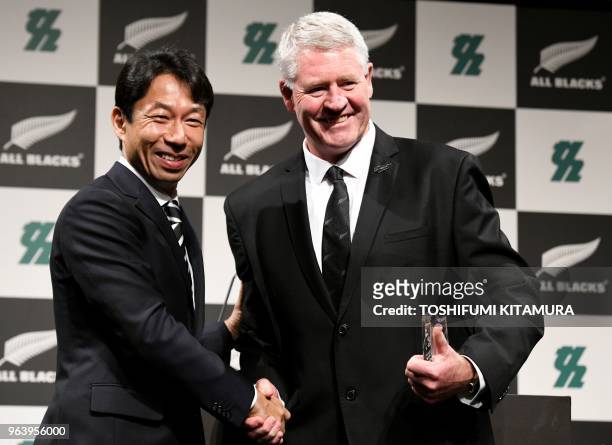 Kashiwa city major Hiroyasu Akiyama greets New Zealand Rugby Union CEO Steve Tew during the New Zealand national rugby union team's pre-camp...