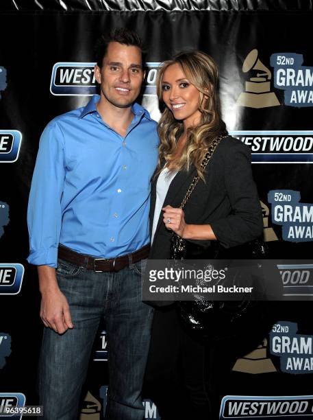 Persoanlities Bill Rancic and Giuliana Rancic attend the 52nd Annual GRAMMY awards backstage at the GRAMMYs Day 2 held at at Staples Center on...