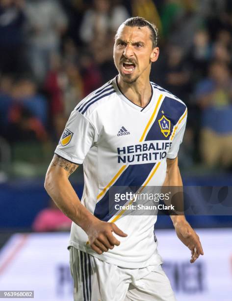 Zlatan Ibrahimovic of Los Angeles Galaxy encourages his team during the Los Angeles Galaxy's MLS match against FC Dallas at the StubHub Center on May...