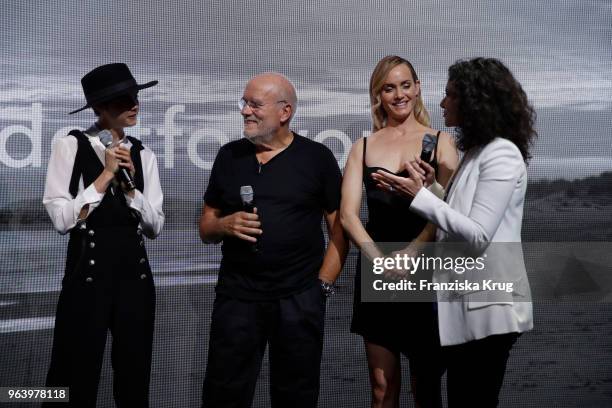 Caro Daur, Cara Delevigne, Peter Lindbergh, Amber Valletta and Tina Mueller, CEO Douglas during the Douglas X Peter Lindbergh campaign launch at...