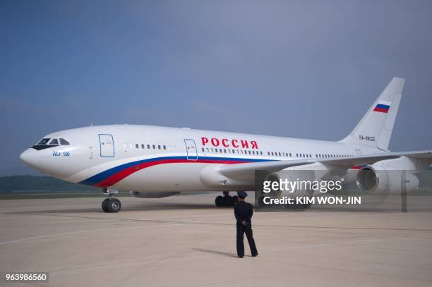 The airplane carrying Russia's Foreign Minister Sergei Lavrov lands at Pyongyang International Airport on May 31, 2018. - Russian Foreign Minister...