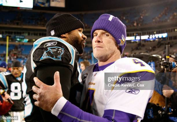 Julius Peppers of the Carolina Panthers against quarterback Brett Favre of the Minnesota Vikings at Bank of America Stadium on December 20, 2009 in...