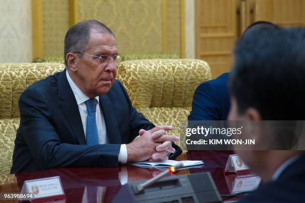 Russia's Foreign Minister Sergei Lavrov talks with North Korea's Foreign Minister Ri Yong Ho at the Mansudae Assembly Hall in Pyongyang on May 31,...