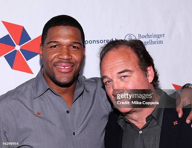 Former professional football player Michael Strahan and actor James Belushi attend the DRIVE4COPD Drivers Meeting at the ESPNZone on February 3, 2010...