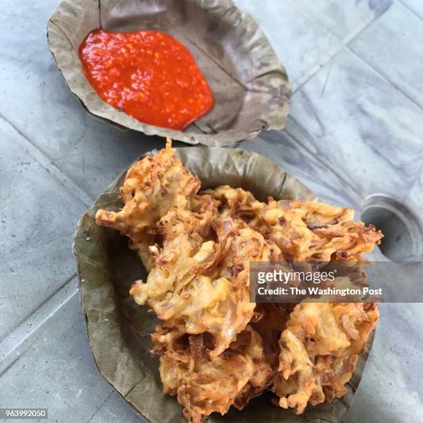In the tiny state of Sikkim in India, which banned disposable plastic plates in 2016, a spicy roadside snack of onion pakora comes on a disposable...