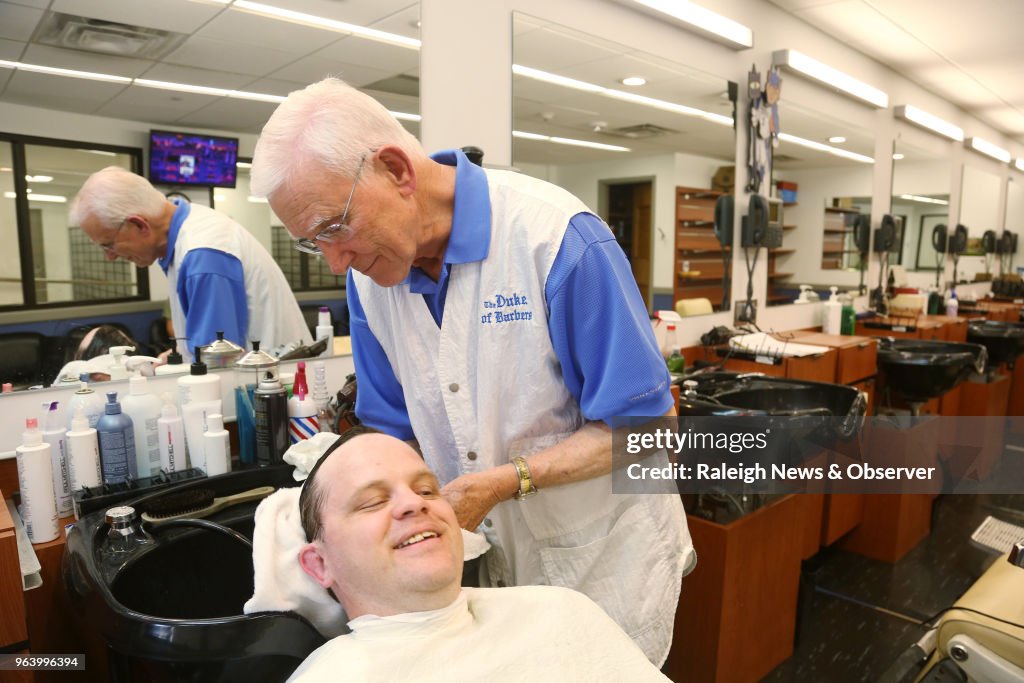 This barber outlasted the flattop and the mullet. At 85, his clippers are still buzzing