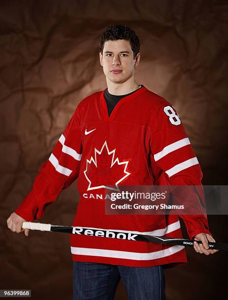 Sidney Crosby of the Pittsburgh Penguins poses for a portrait in his Team Canada 2010 Olympic jersey on February 3, 2010 at Mellon Arena in...