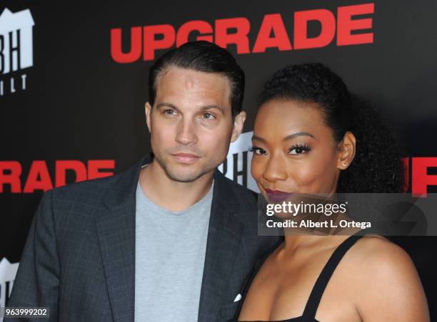 Actor Logan Marshall-Green and actress Betty Gabriel arrive for the premiere of BH Tilt's "Upgrade" held at the Egyptian Theatre on May 30, 2018 in...